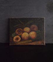 桃とナイフの油彩画