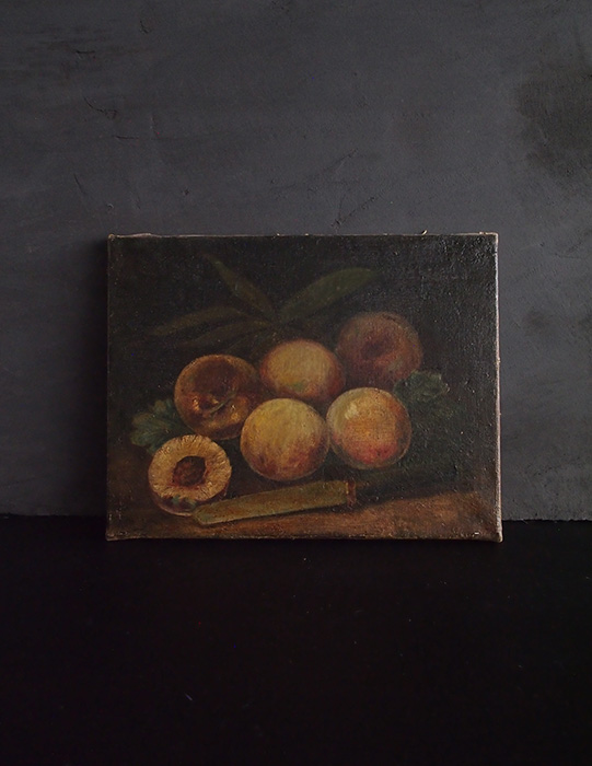 桃とナイフの油彩画